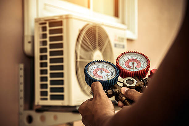 Professional Air Conditioning Service technician working in Wilmington, IL